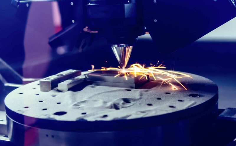 3D metal printer produces a steel part. A revolutionary technology for sintering metal parts. Soft focus.