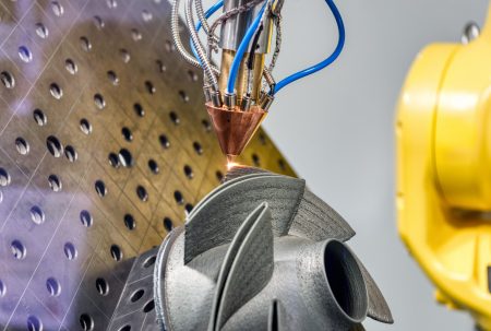 3D metal printer produces a steel part. Revolutionary additive technology for sintering metal parts. Soft focus.